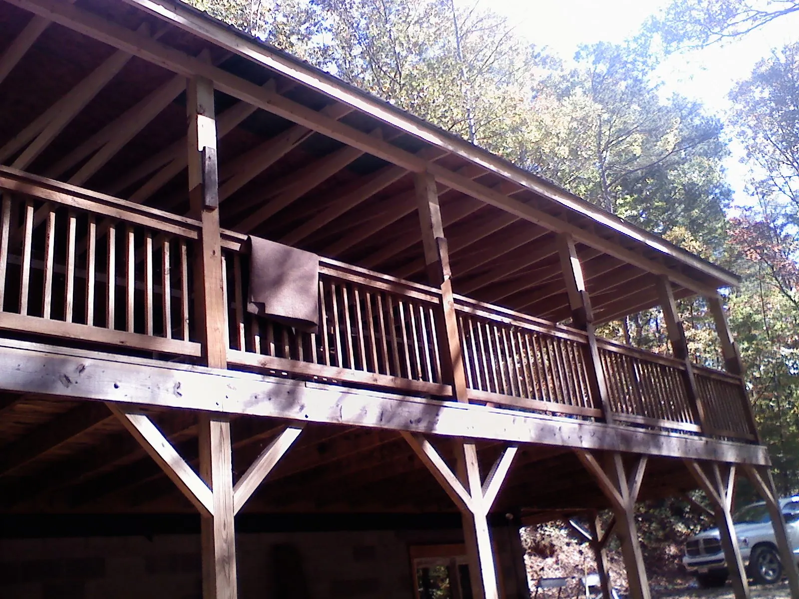 Timber framing under a new elevated porch and deck — Roof Leak Repair in Sagamore Beach by Roofing Brothers